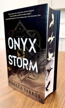 Deluxe Edition hardback copy of Onyx Storm, by Rebecca Yarros